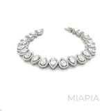 Lustre Pear Halo Tennis Bracelet