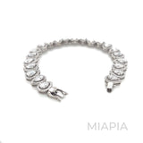 Lustre Pear Halo Tennis Bracelet